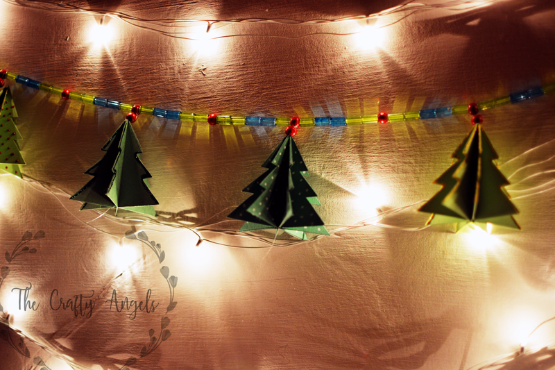 diy paper christmas tree garland, christmas tree decor, christmas tree ornament, diy tree ornament, diy paper christmas tree ornament, holiday crafting, holiday activity, holiday decor, holiday idea