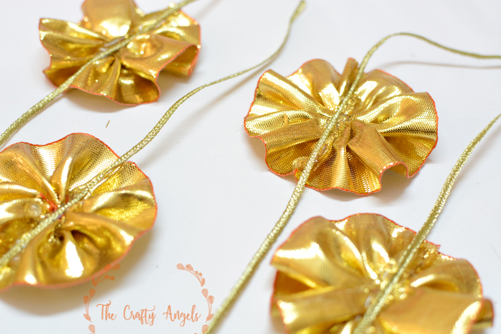 Gota rakhi making tutorial - sticking string to the rakhi 