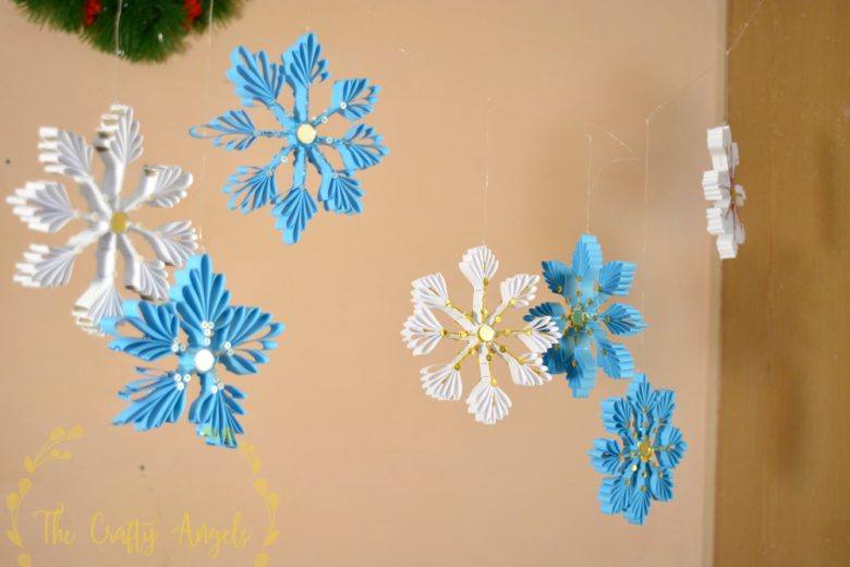 DIY Paper snowflakes Christmas Ornaments Tutorial - The Crafty Angels